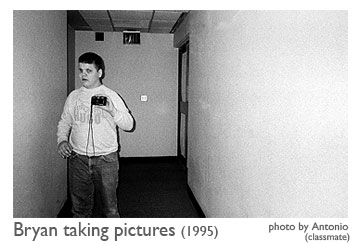 Bryan in 1995 taking pictures at Governor Morehead School. Photo by Antonio, who was a classmate of Bryan's.